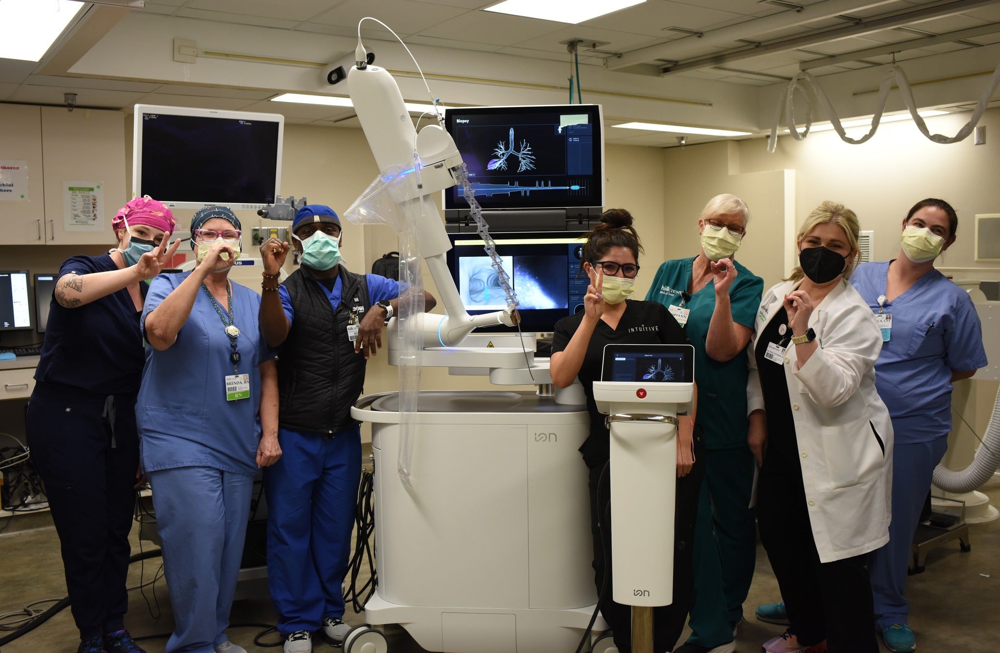 The endoscopy care team stops to celebrate their 200th procedure with the revolutionary Da Vinci ION robot in September of 2022.